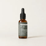 Commen Nº.22 Ginkgo Antioxidant Boost, an amber dropper bottle with a dark label, standing on light paper.